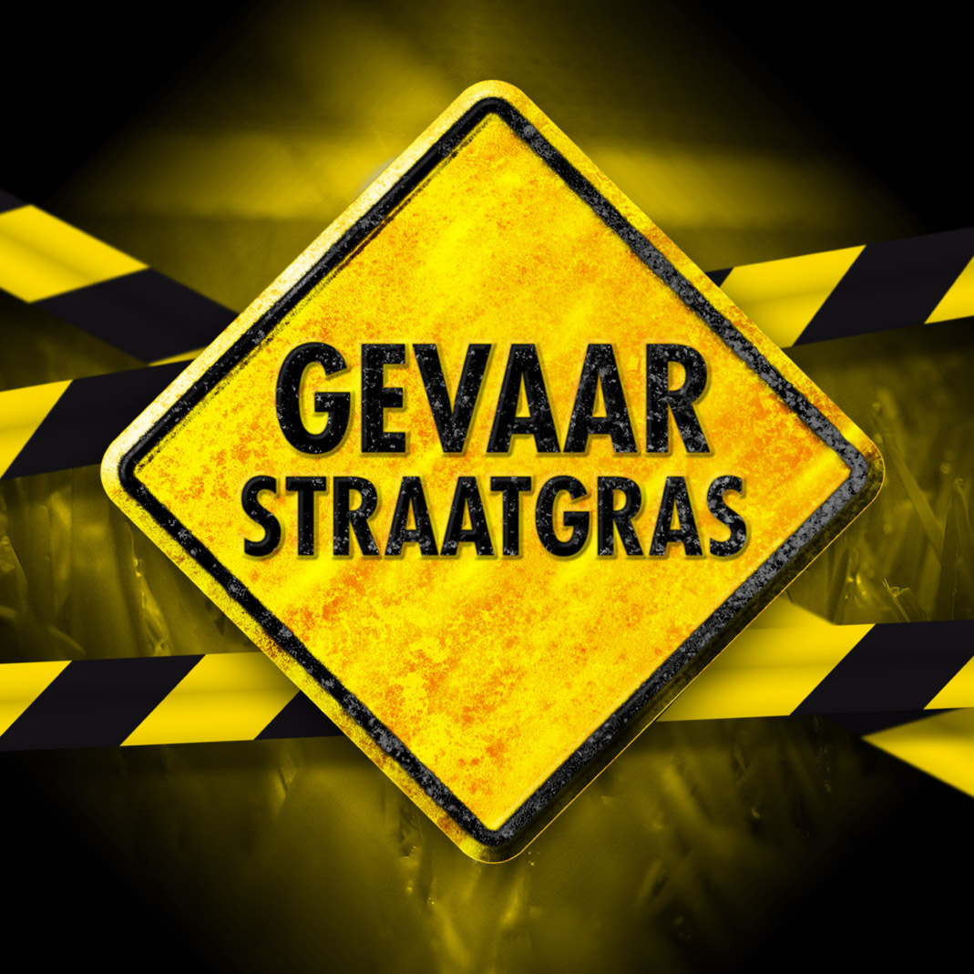 Kale plekken gras, prooi voor straatgras